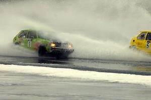 The Matt Bjorge / Dave Bjorge VW Rabbit gets doused by the Dave Kapaun / Chris Wilke VW Rabbit