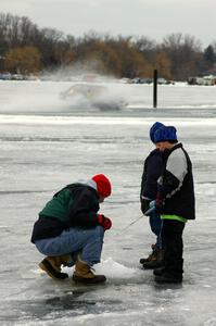 Dan Burhans, Sr. / Dan Burhans II SAAB 900 passes by some folks out ice fishing