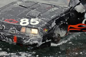 The Lyle Nienow / Mark Nienow Chevy Cavalier Z-24 lost a wheel after hitting a chuck hole at speed