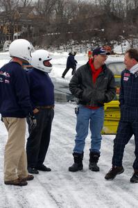 Tony Burhans, Dan Burhans, Sr., Cary Kendall and Dave Kapaun converse after the shortened race