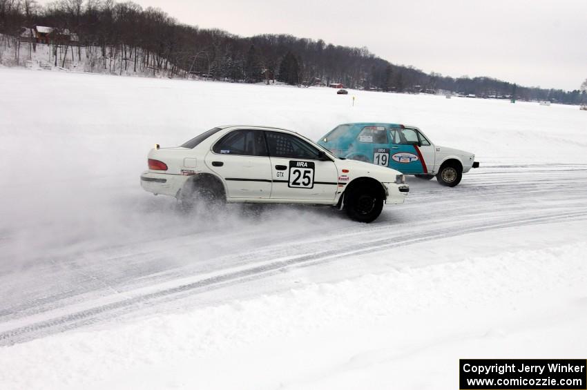 Mike Ehleringer / Dick Nordby / Bill Nelson VW Rabbit and Chris Peterson / Dave McGovern Subaru Impreza battle for the lead