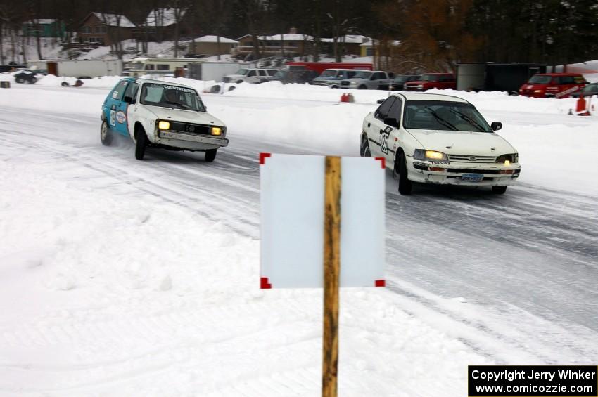 Chris Peterson / Dave McGovern Subaru Impreza and Mike Ehleringer / Dick Nordby / Bill Nelson VW Rabbit battle for the lead