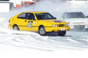 Dan Burhans, Sr. / Tony Burhans SAAB 9-3 chased by the Dave McGovern / Nick Goetz Subaru Impreza