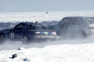 Dick Nordby / Bill Nelson VW Rabbit tries for an outside pass on the Steve Kuehl / Marco Martinez Mazda RX-7