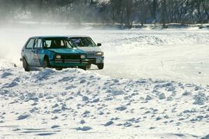 Dick Nordby / Bill Nelson VW Rabbit is chased by the Dave McGovern / Nick Goetz Subaru Impreza