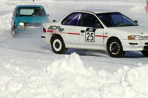 Dave McGovern / Nick Goetz Subaru Impreza is chased by the Dick Nordby / Bill Nelson VW Rabbit