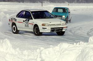 Dave McGovern / Nick Goetz Subaru Impreza is chased by the Dick Nordby / Bill Nelson VW Rabbit