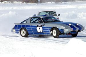 Steve Kuehl / Marco Martinez Mazda RX-7 is followed by the Chuck Peterson / Bob Roth SAAB 99