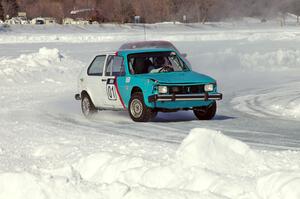 Dick Nordby / Bill Nelson VW Rabbit passes the Jason Beck / Kevin Beck Dodge Shadow