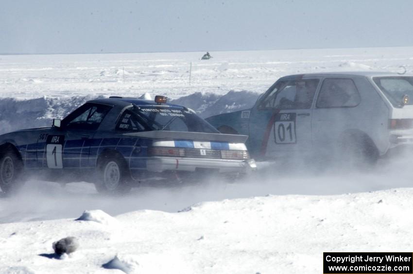 Dick Nordby / Bill Nelson VW Rabbit tries for an outside pass on the Steve Kuehl / Marco Martinez Mazda RX-7