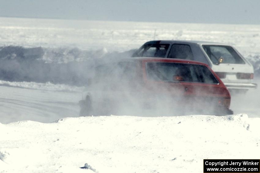 Dick Nordby / Bill Nelson VW Rabbit passes the John Kochevar / Ron Verhaagen, Sr. VW Scirocco