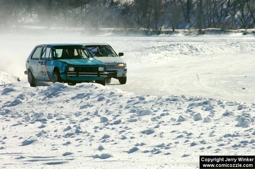 Dick Nordby / Bill Nelson VW Rabbit is chased by the Dave McGovern / Nick Goetz Subaru Impreza