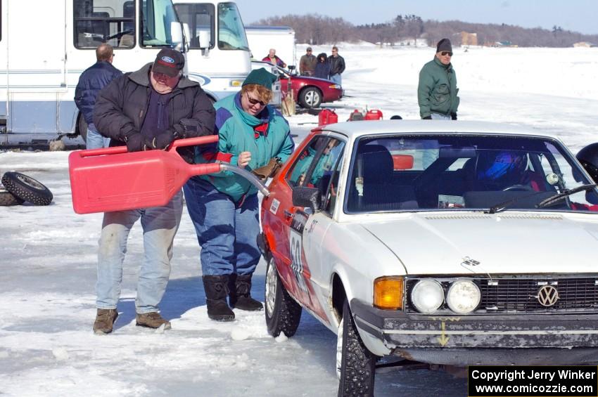 John Kochevar / Ron Verhaagen, Sr. VW Scirocco comes in for fuel and a driver change.