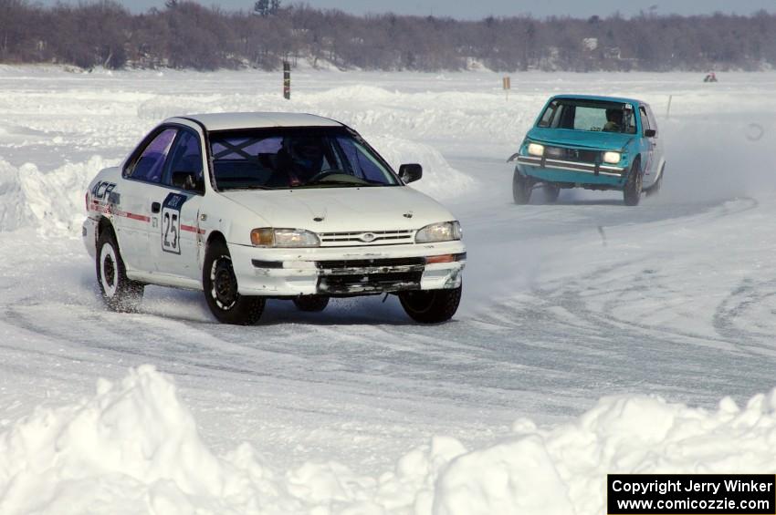 Dave McGovern / Nick Goetz Subaru Impreza is chased by the Dick Nordby / Bill Nelson VW Rabbit