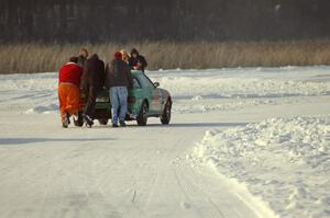 Don Hupe / Marco Martinez / Steve Kuehl Mazda RX-7 gets a push back to the pits