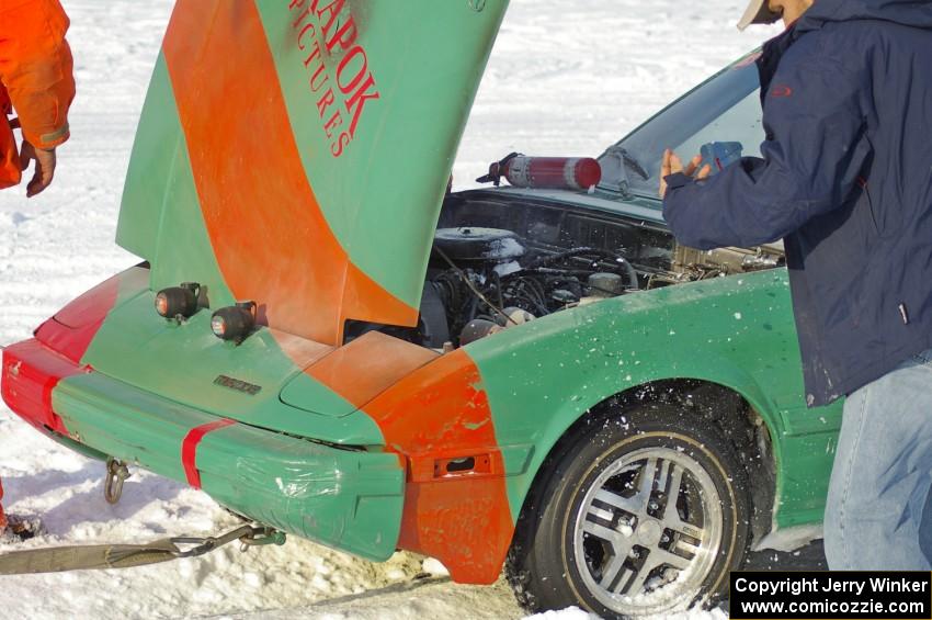 Don Hupe / Marco Martinez / Steve Kuehl Mazda RX-7 had a small engine fire