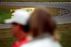 Gary Curtis' GT-1 Panoz Esperante past corner workers at turn 4