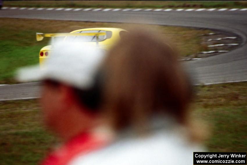 Gary Curtis' GT-1 Panoz Esperante past corner workers at turn 4