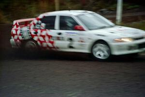 The Henry Joy IV / Michael Fennell Mitsubishi Lancer Evo 2 gets a shakedown run on the press stage.