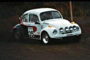 The Reny Villemure / Mike Villemure VW Beetle slings gravel on the press stage.