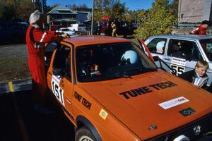 Al Kintigh navigated for Doug Davenport in his VW GTI. Al's son Alex or Nick is near the left-front fender.