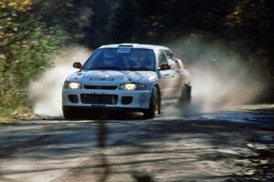 The Henry Joy IV / Michael Fennell Mitsubishi Lancer Evo 2 at speed on the Menge Creek stage.
