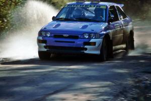 Carl Merrill / John Bellefleur hit a puddle at speed on Menge Creek 1 in the Ford Escort Cosworth RS.
