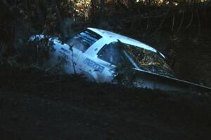 Ted Grzelak / Dan Gildersleeve Mazda RX-7 flew over and cleared Menge Creek, but there was no way of getting back on the road.