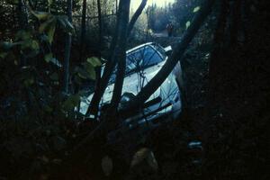 Ted Grzelak / Dan Gildersleeve Mazda RX-7 flew over and cleared Menge Creek, but there was no way of getting back on the road.