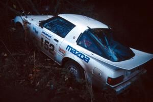 Ted Grzelak / Dan Gildersleeve Mazda RX-7 flew over and cleared Menge Creek, but there was no way of getting back on the road.