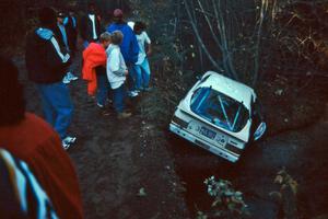 Spectators flocked to the scene of the wrecked Ted Grzelak / Dan Gildersleeve Mazda RX-7 on the bank of Menge Creek.