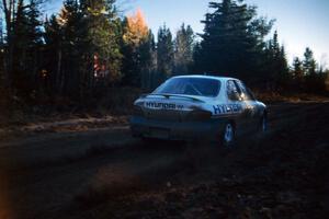 Paul Choinere / John Buffum throw rooster-tails at the start of Menge Creek 2 in their Hyundai Elantra.