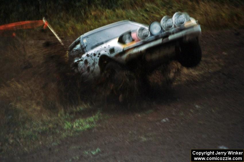 Brent Cary and scared passenger have a scary moment trying to pull their Mazda RX-7 out of a hairpin to avoid rolling.