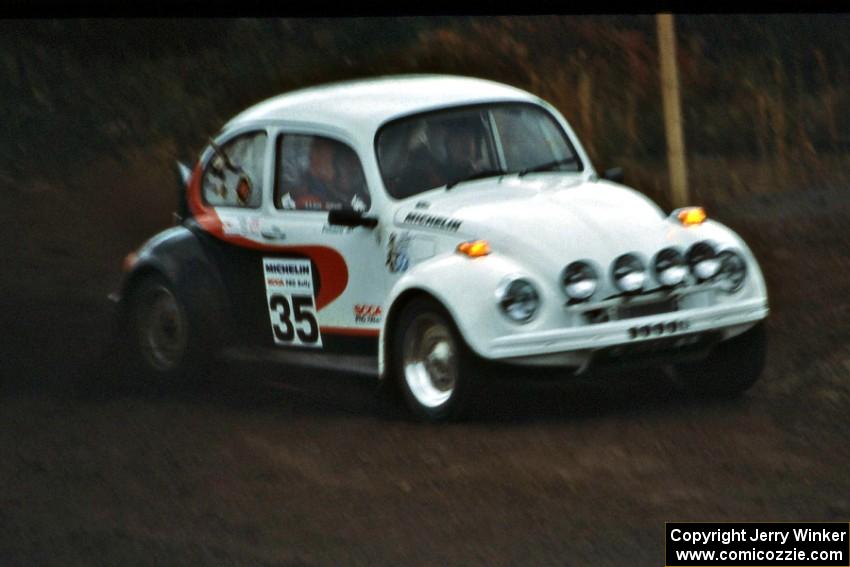 The Reny Villemure / Mike Villemure VW Beetle slings gravel on the press stage.