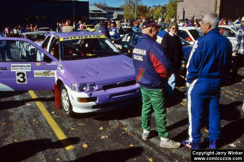 John Bellefleur and Selcuk Karamanoglu have a chat in front of the Carl Merrill Ford Escort Cosworth RS at parc expose.