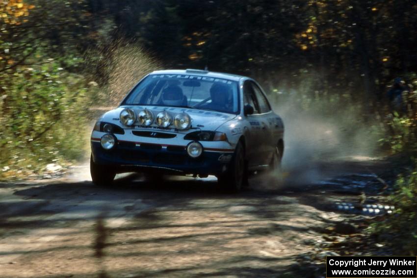 Paul Choinere / John Buffum in the Hyundai Elantra at speed on the Menge Creek stage.