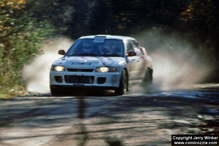 The Henry Joy IV / Michael Fennell Mitsubishi Lancer Evo 2 at speed on the Menge Creek stage.