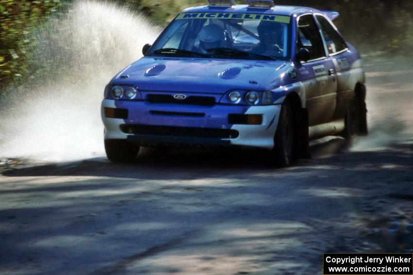 Carl Merrill / John Bellefleur hit a puddle at speed on Menge Creek 1 in the Ford Escort Cosworth RS.