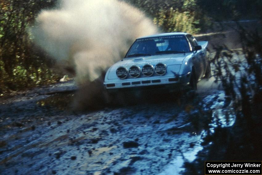 Ted Grzelak / Dan Gildersleeve hit a puddle at speed in their Mazda RX-7 only to have ...