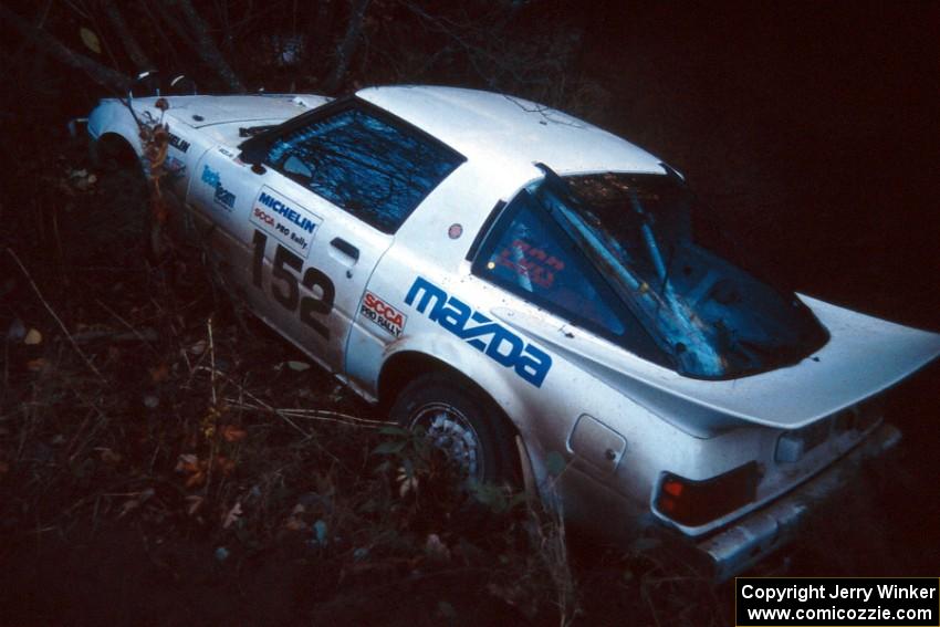 Ted Grzelak / Dan Gildersleeve Mazda RX-7 flew over and cleared Menge Creek, but there was no way of getting back on the road.