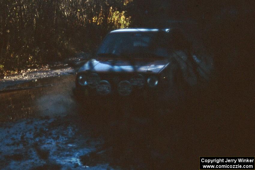 Doug Davenport / Al Kintigh in the VW GTI also take a conservative line at the final Menge Creek bridge.