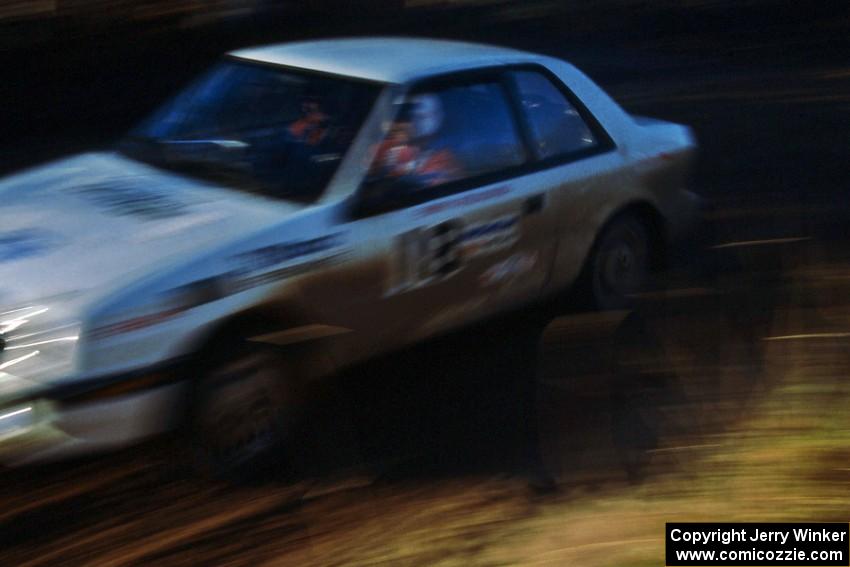 The Henry Krolikowski / Cindy Krolikowski Dodge Shadow blasts through the first corner of Menge Creek 2.