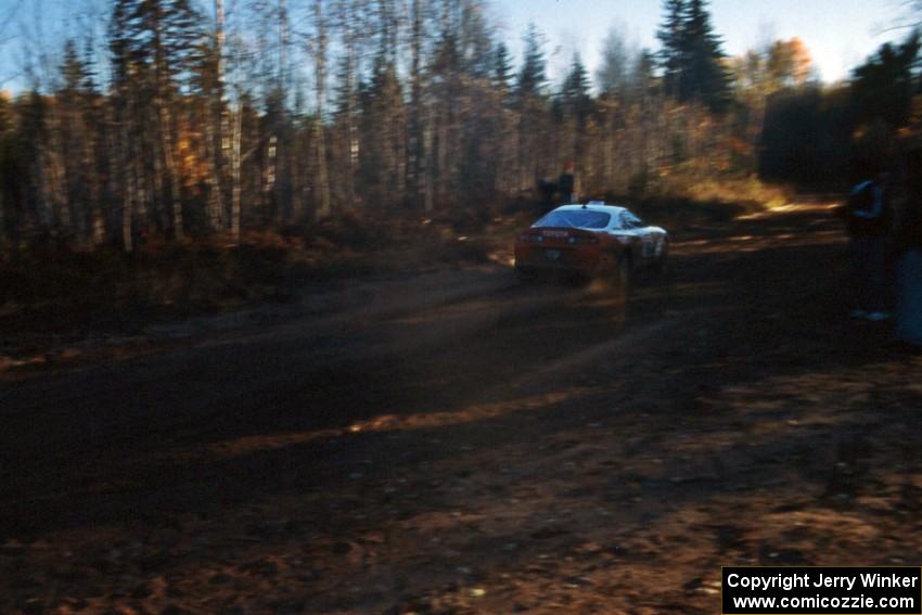 The Ralph Kosmides / Joe Noyes Toyota Supra leaves the start of Menge Creek 2 just before sundown.