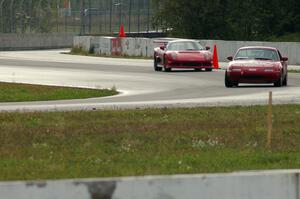 Dan Corgard's Mazda Miata and Glenn Ciegler's Noble through turns 10 and 11