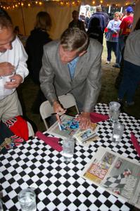 Bobby Unser signs autographs