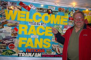 Memorabilia Wall at BIR's 40th Anniversary. Tim Winker points to the 'Texas Oil Men' sticker.