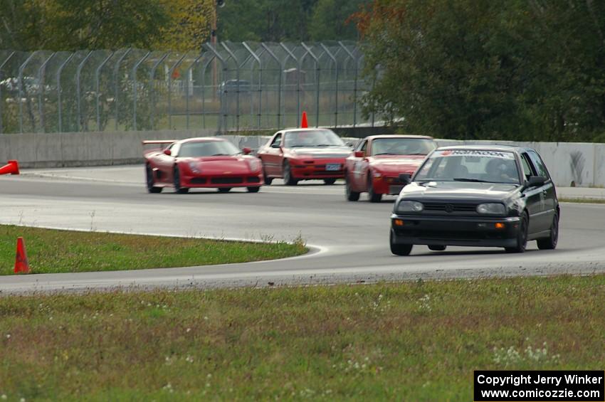 Cars coming through turns 10 and 11