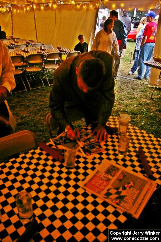 Bobby Unser signs autographs