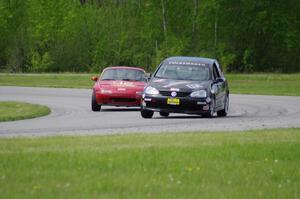 David Daly's SCC VW Rabbit and Greg Youngdahl's Spec Miata Mazda Miata