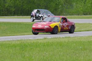 Greg Youngdahl's ITA Mazda Miata and David Daly's SCC VW Rabbit